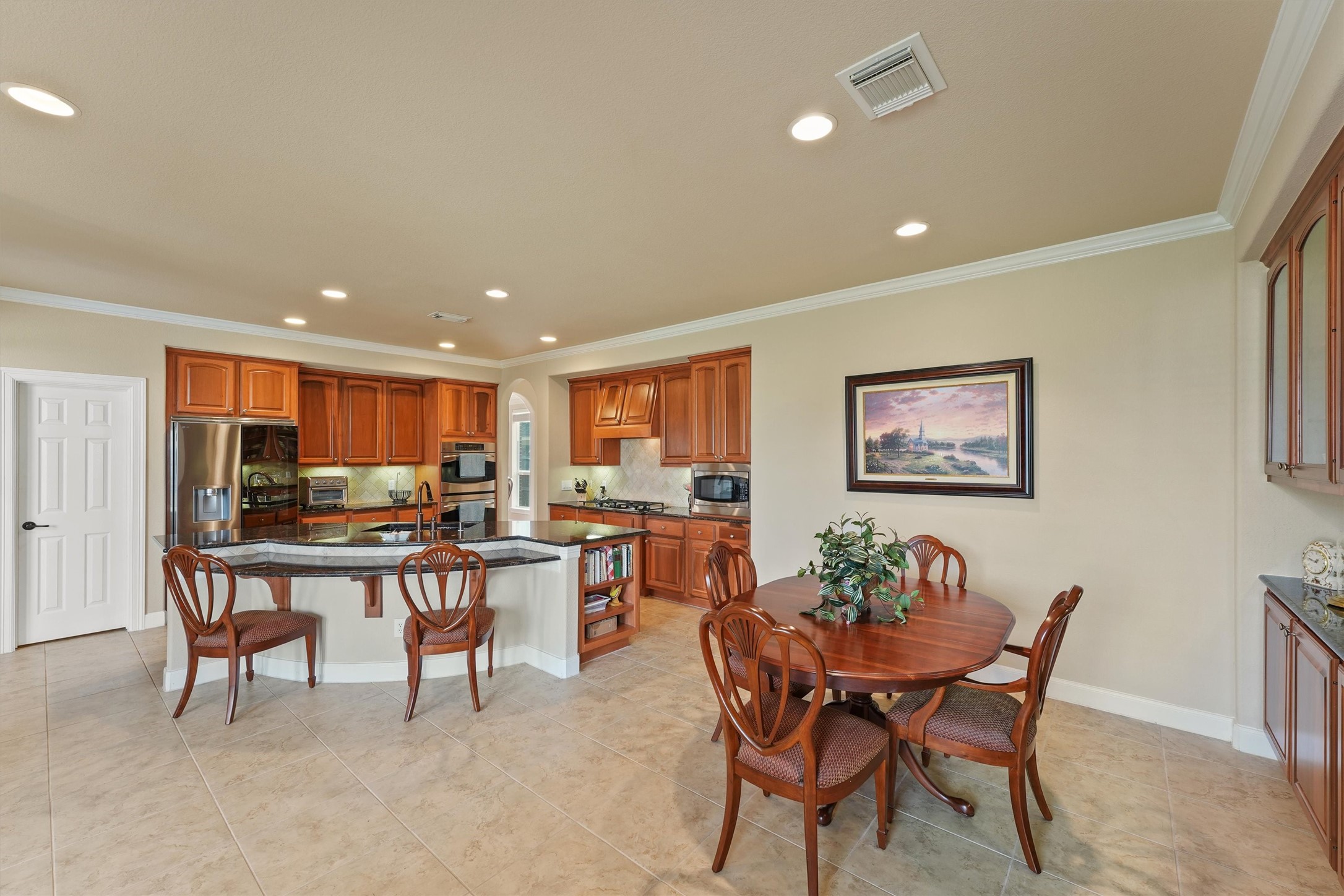 15702 Bellforest Court Houston, TX 77044 - Photo 11 of 38 a view of a dining room with furniture