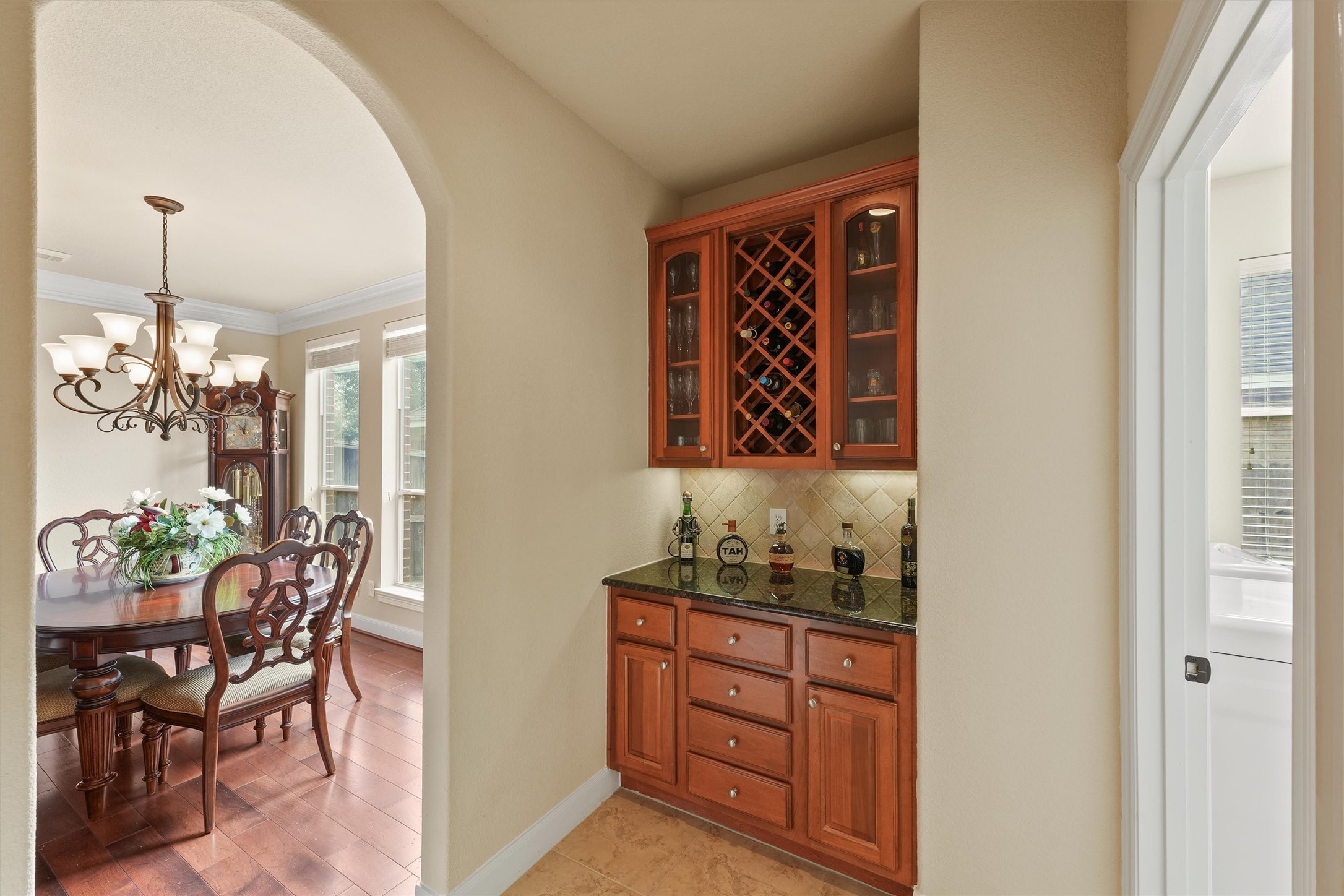 15702 Bellforest Court Houston, TX 77044 - Photo 19 of 38 a dining room with furniture and window