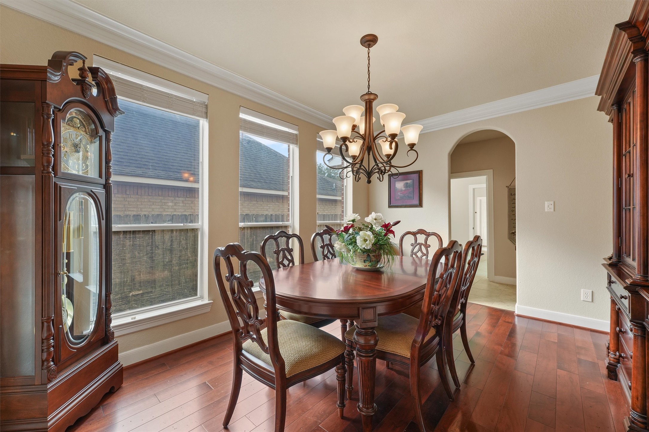 15702 Bellforest Court Houston, TX 77044 - Photo 20 of 38 a view of a dining room with furniture and chandelier