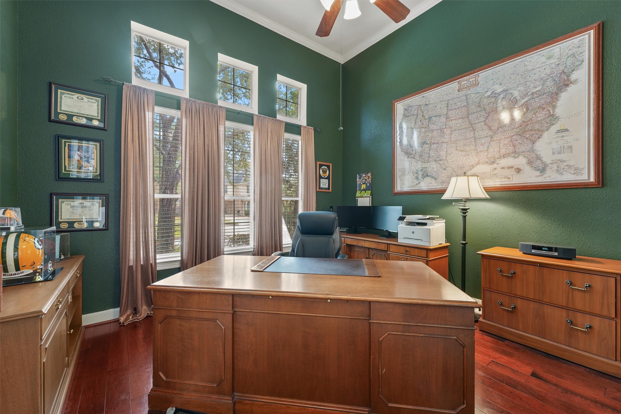 15702 Bellforest Court Houston, TX 77044 - Photo 21 of 38 a view of a workspace with furniture and a window
