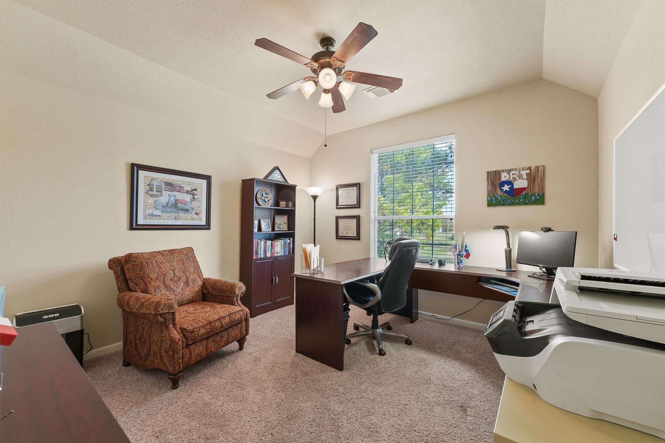 15702 Bellforest Court Houston, TX 77044 - Photo 27 of 38 a living room with furniture and a large window