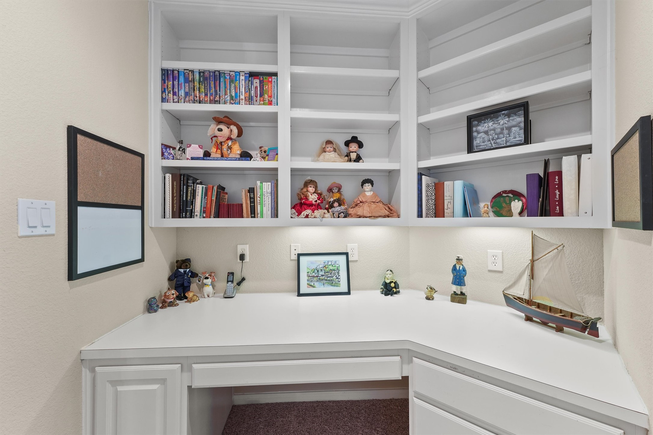15702 Bellforest Court Houston, TX 77044 - Photo 28 of 38 a room with a book shelf and a book shelf