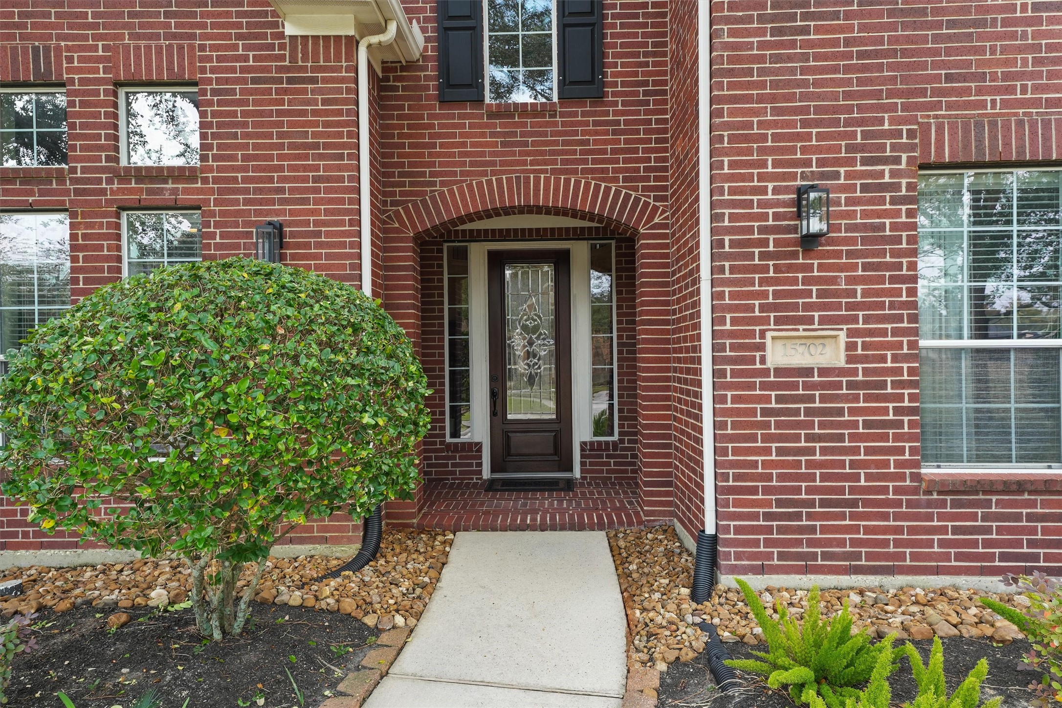 15702 Bellforest Court Houston, TX 77044 - Photo 3 of 38 a front view of a house