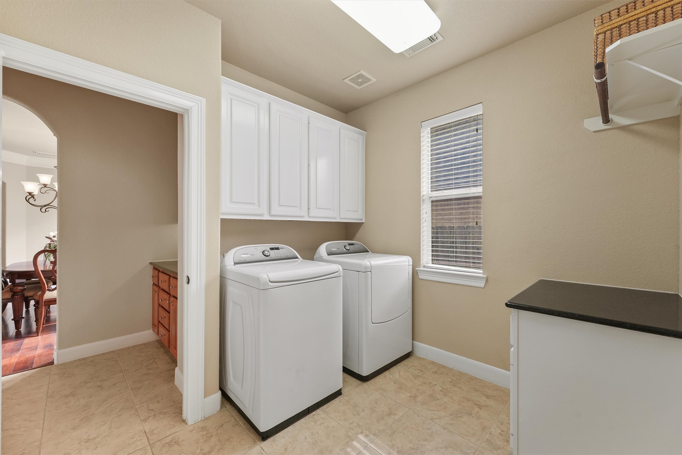 15702 Bellforest Court Houston, TX 77044 - Photo 31 of 38 a utility room with dryer and washer