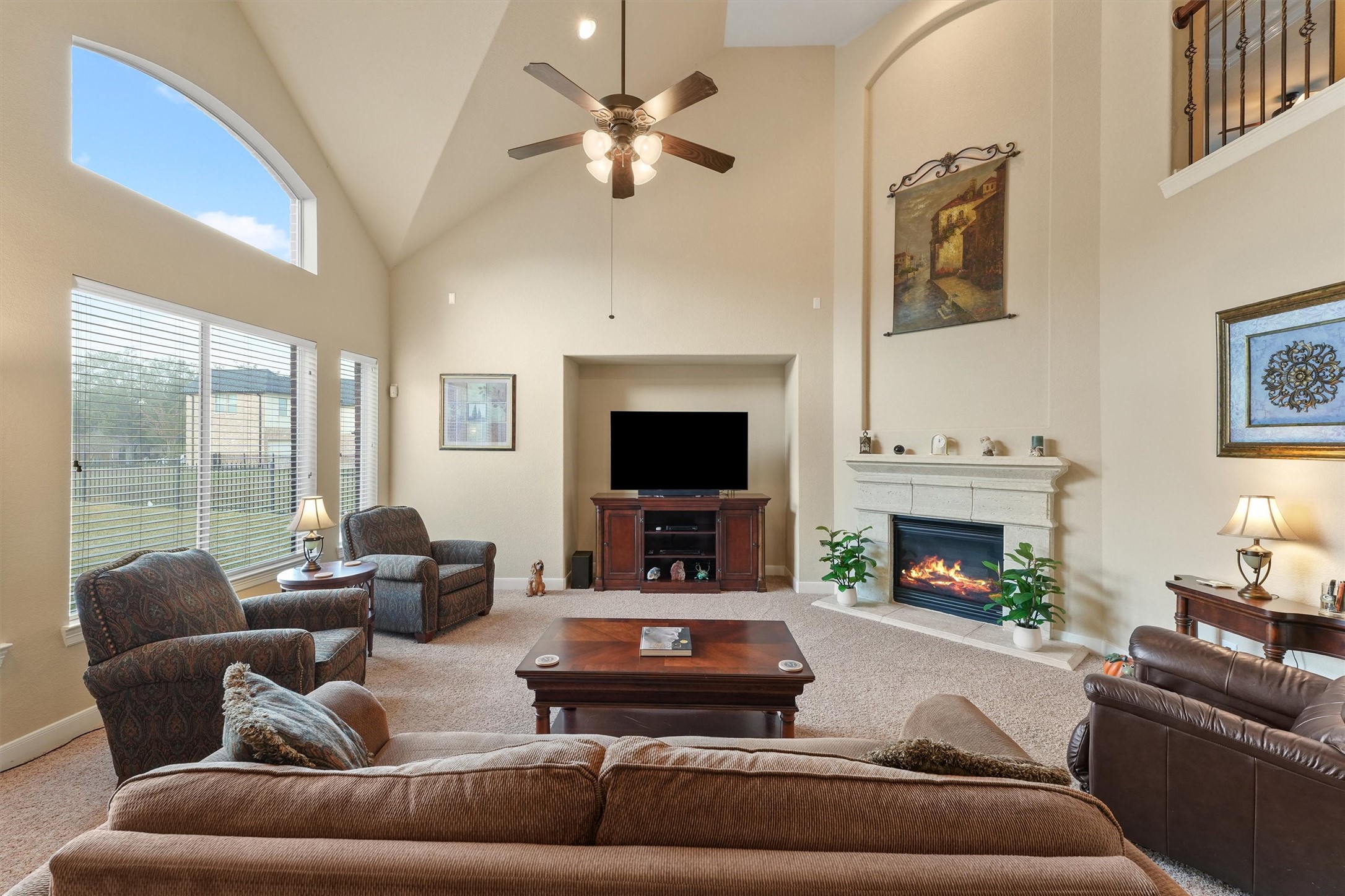 15702 Bellforest Court Houston, TX 77044 - Photo 5 of 38 a living room with furniture and a fireplace