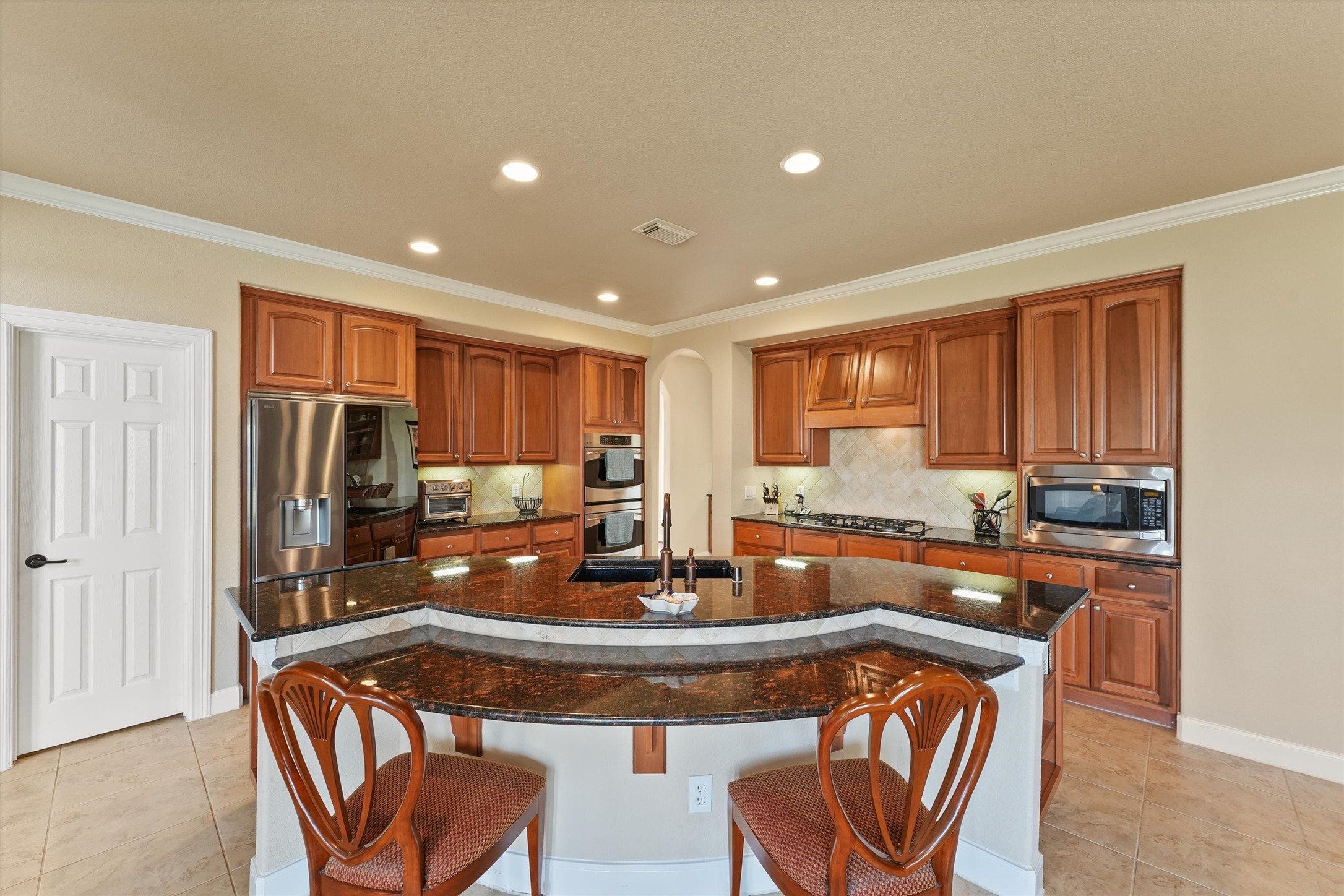 15702 Bellforest Court Houston, TX 77044 - Photo 8 of 38 a view of a dining room with furniture window and outside view