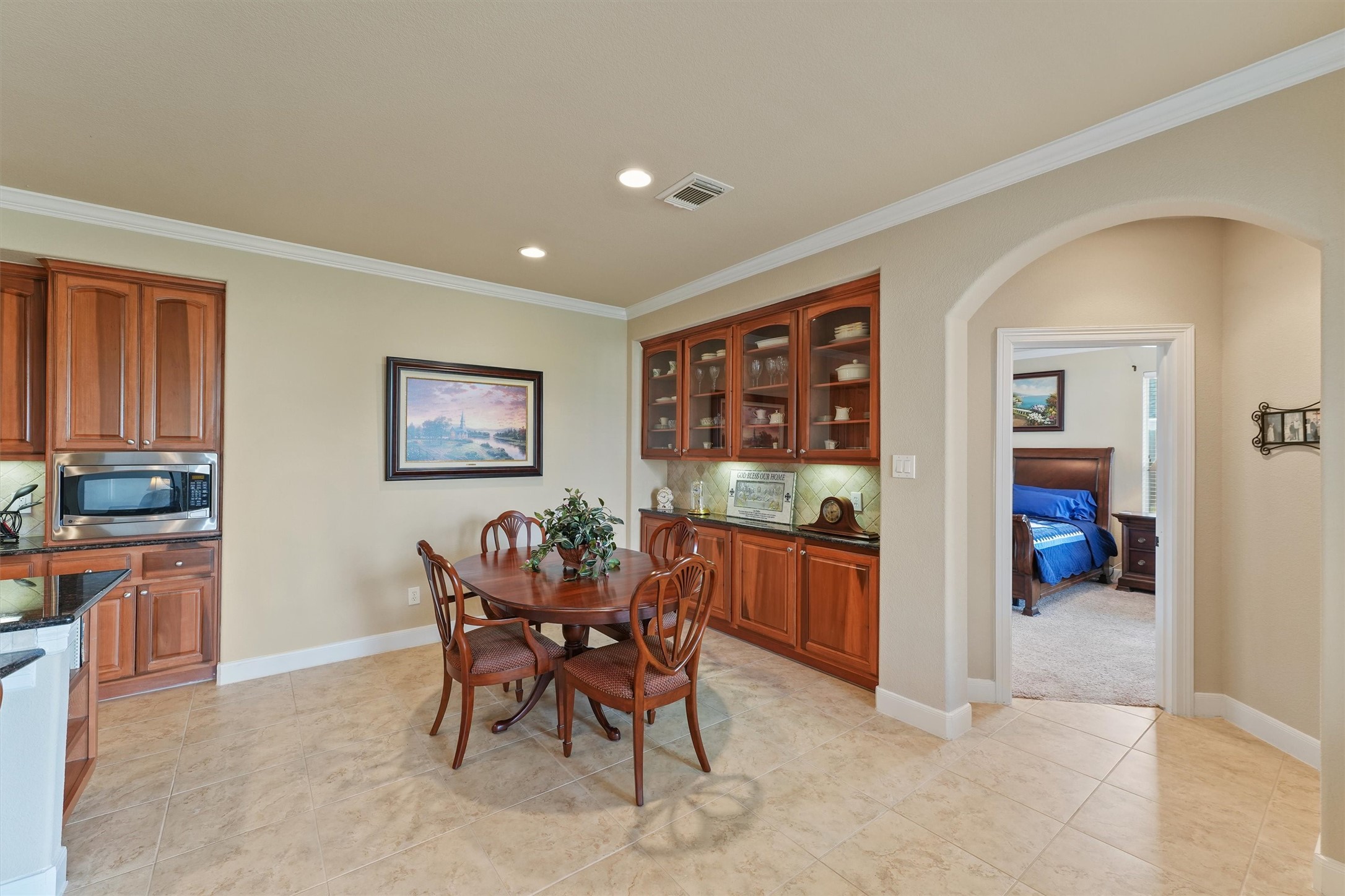 15702 Bellforest Court Houston, TX 77044 - Photo 10 of 38 a dining room with furniture and window