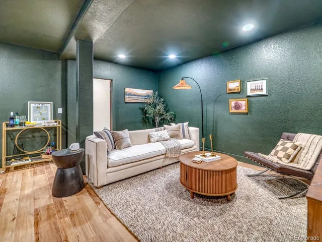 a living room with a couch and a table