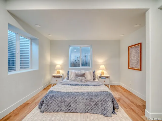 a view of a livingroom with table and chairs