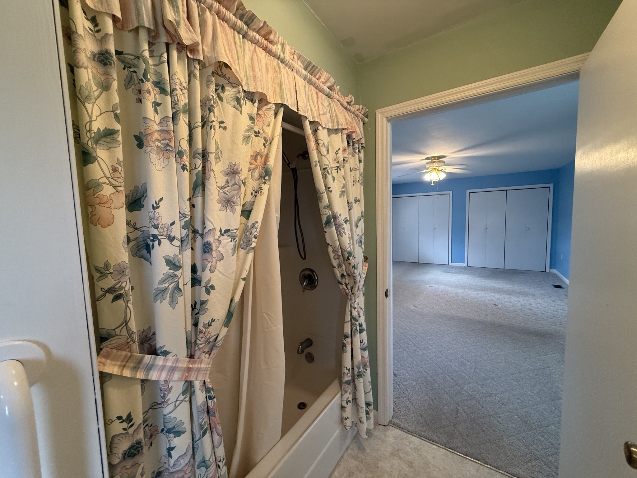 2971 Monroe Floyd Road Decherd, TN 37324 - Photo 16 of 26 a bathroom with a shower and a glass door