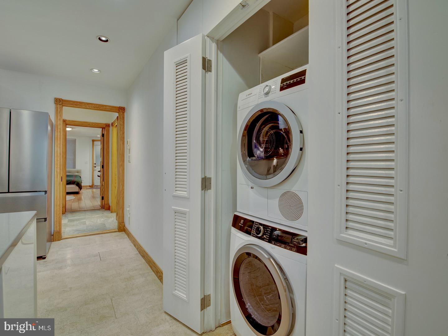 1705 Q Street Northwest Washington, DC 20009 - Photo 75 of 87 a view of a hallway with washer and dryer