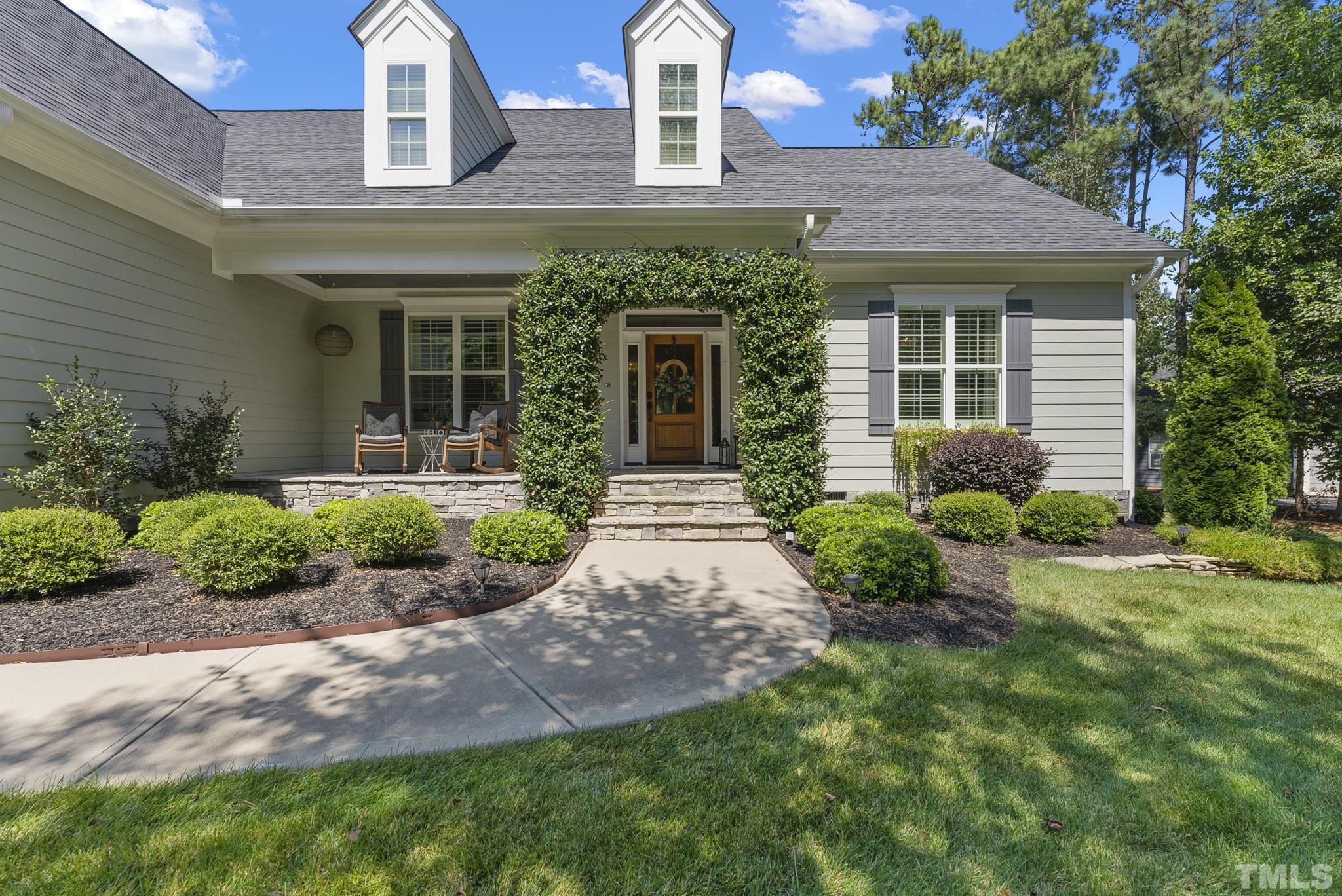 6121 Spring Branch Circle Raleigh, NC 27603 - Photo 2 of 60 a front view of a house with garden