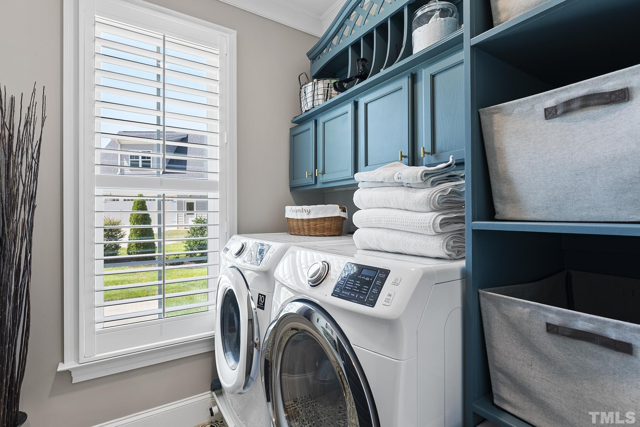6121 Spring Branch Circle Raleigh, NC 27603 - Photo 27 of 60 a utility room with dryer and washer