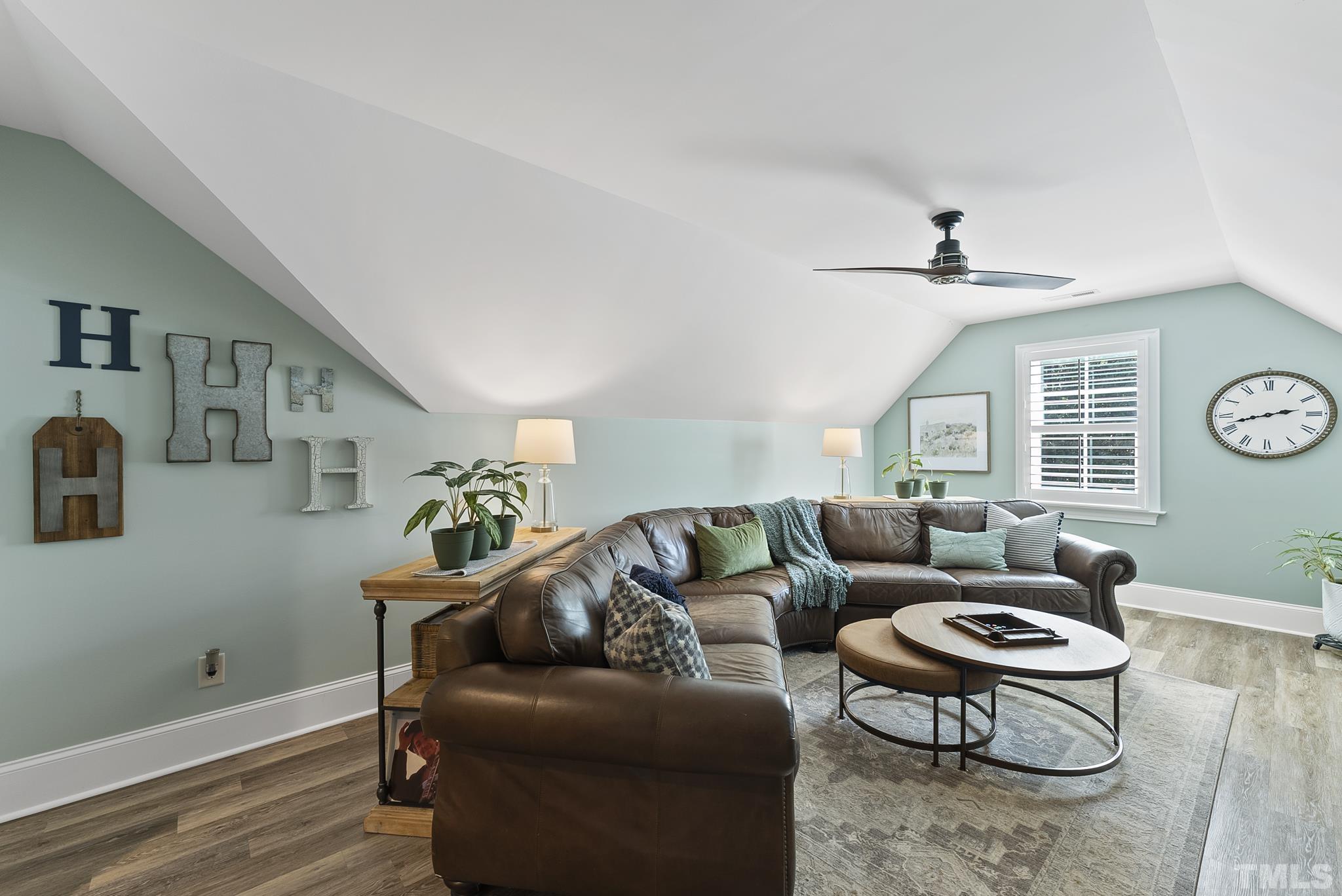6121 Spring Branch Circle Raleigh, NC 27603 - Photo 31 of 60 a living room with furniture and a window