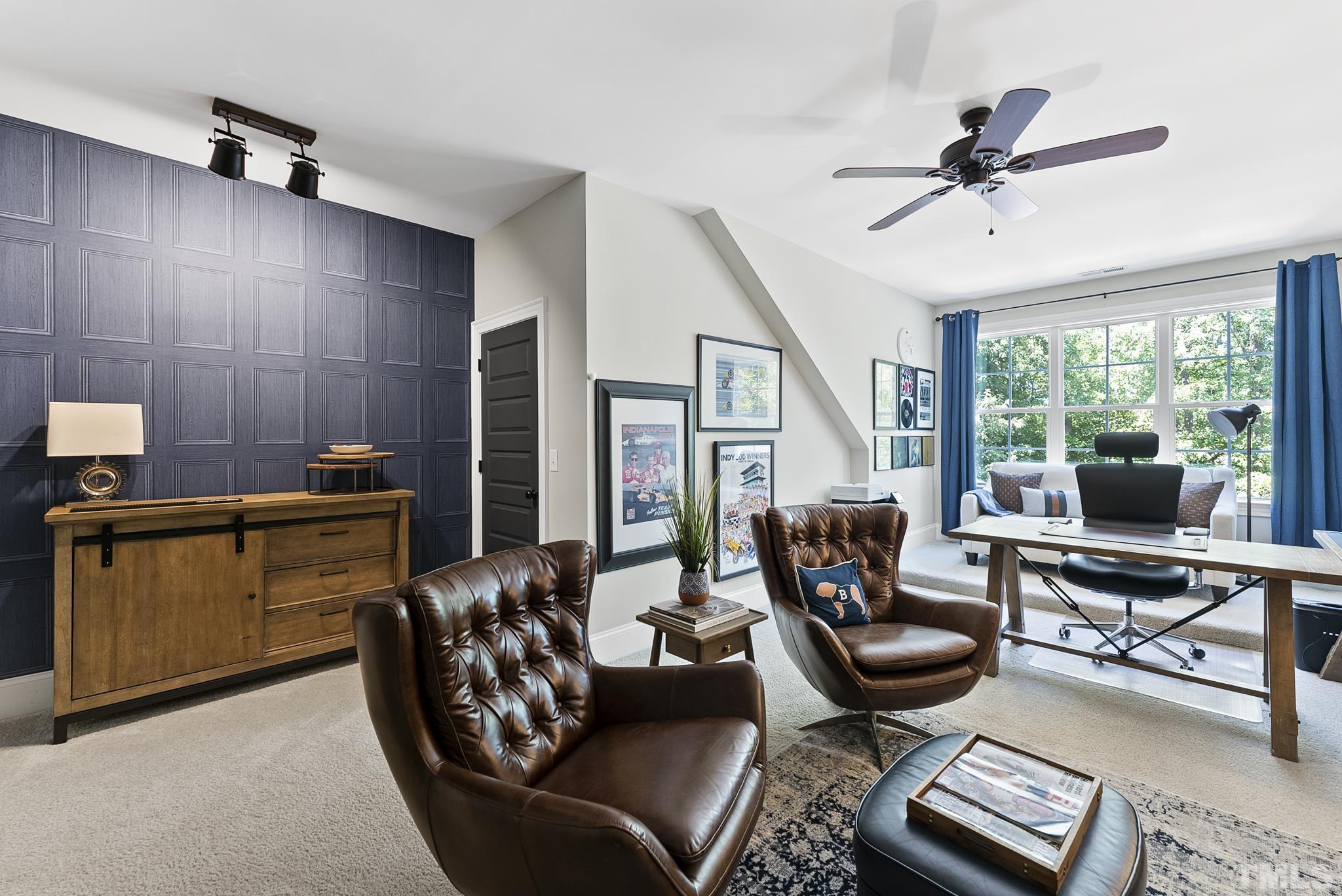 6121 Spring Branch Circle Raleigh, NC 27603 - Photo 33 of 60 a living room with furniture and a window