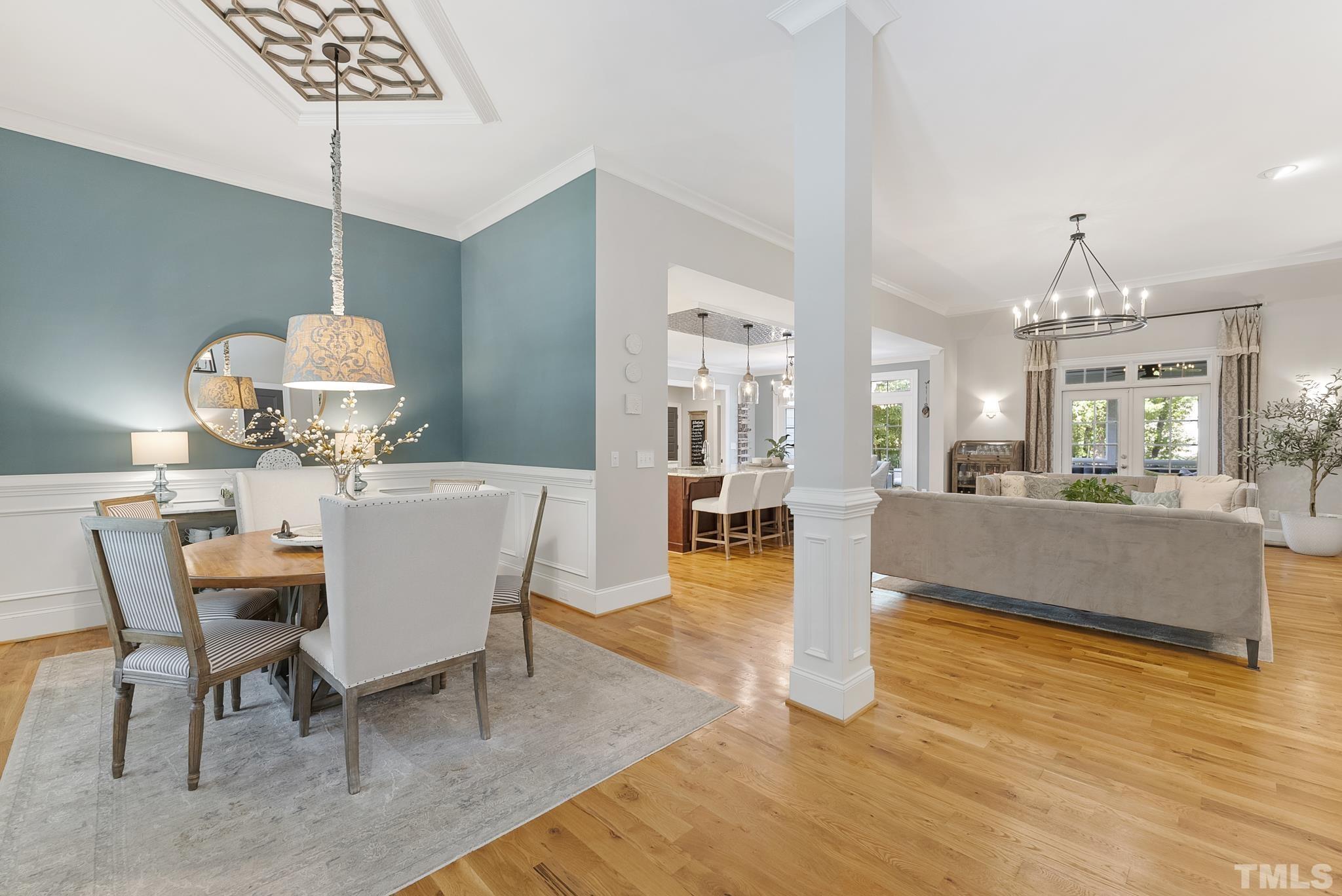 6121 Spring Branch Circle Raleigh, NC 27603 - Photo 4 of 60 a view of a dining room with furniture and wooden floor