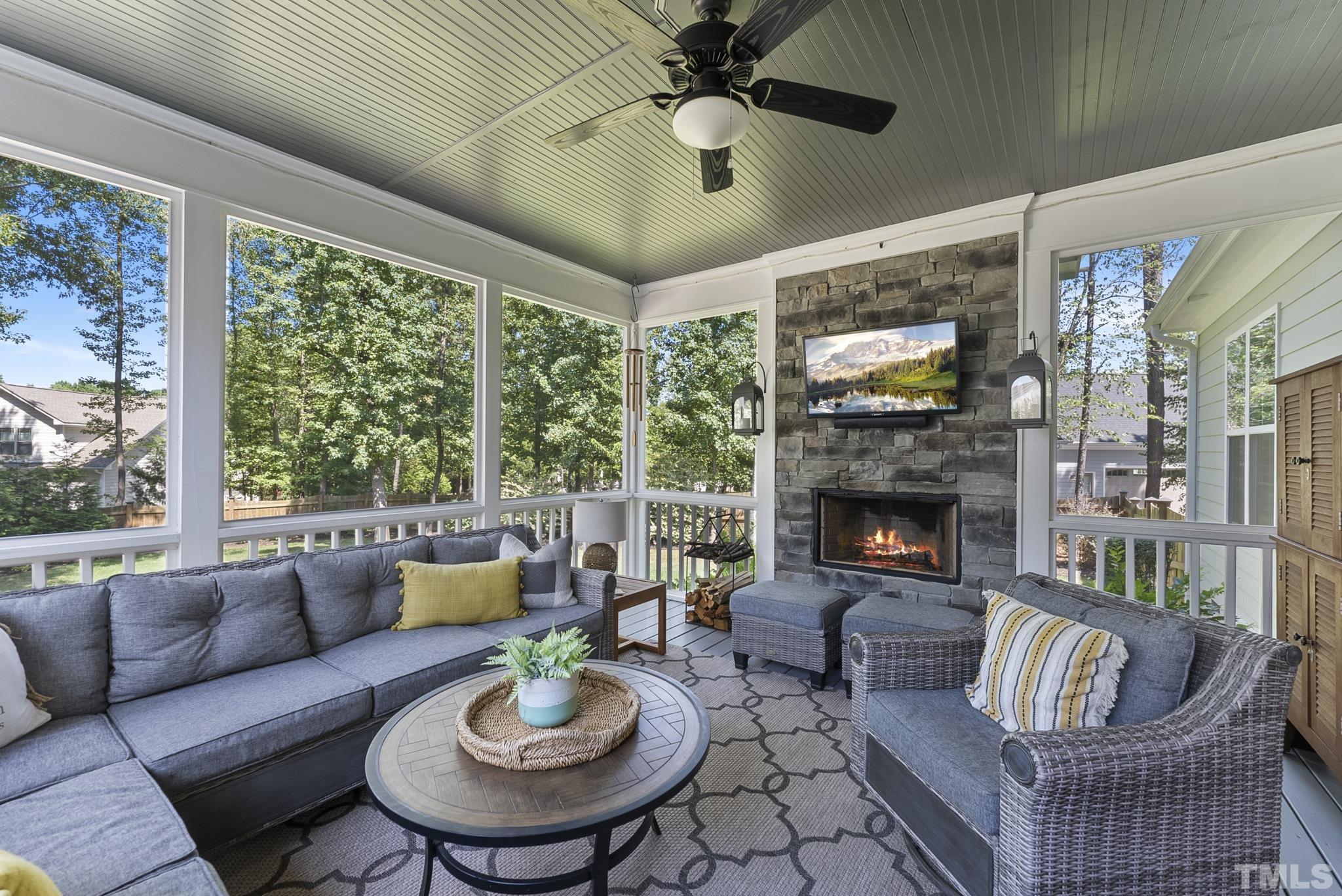 6121 Spring Branch Circle Raleigh, NC 27603 - Photo 41 of 60 a living room with furniture and a fireplace