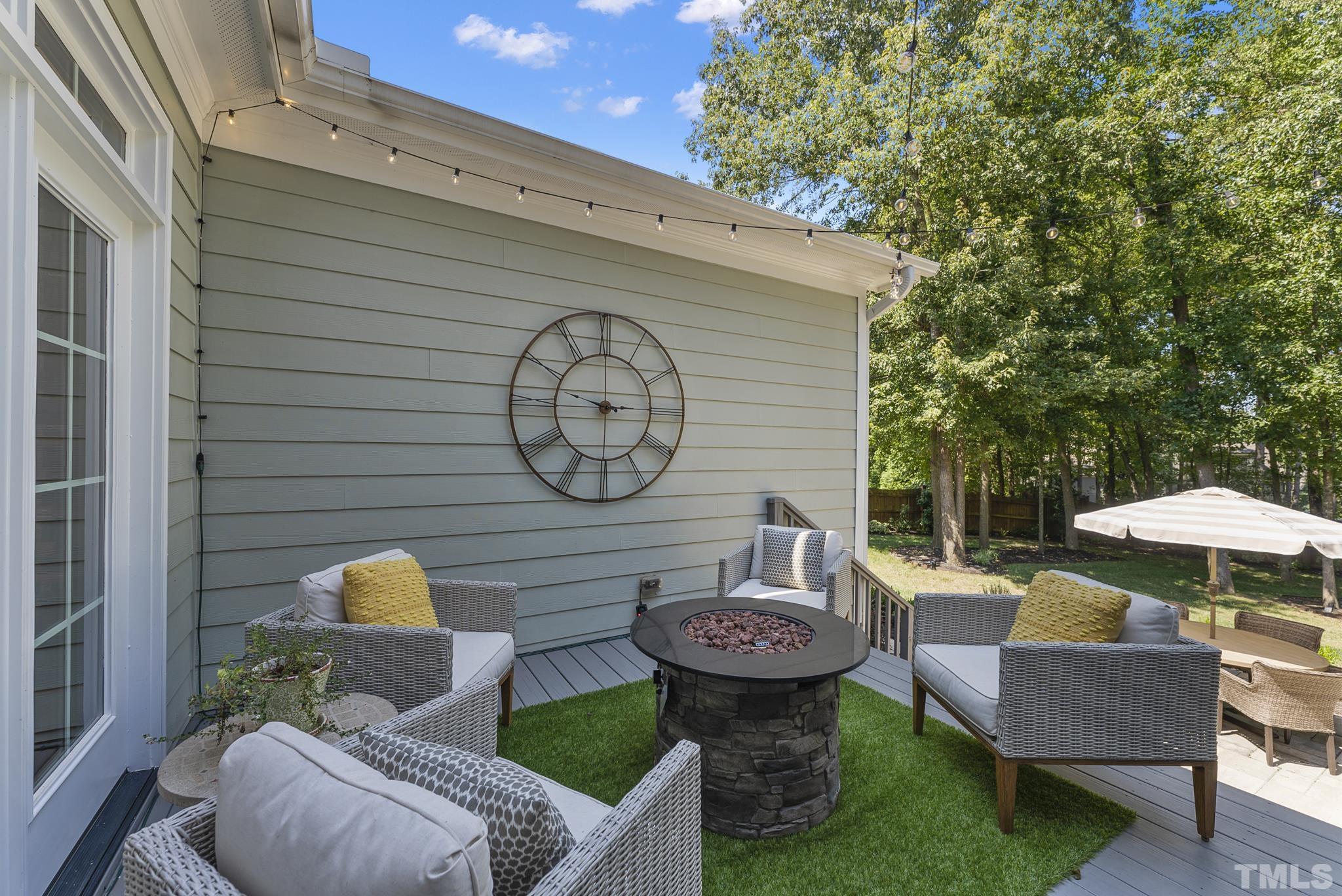 6121 Spring Branch Circle Raleigh, NC 27603 - Photo 42 of 60 a view of a chairs and table in backyard of the house