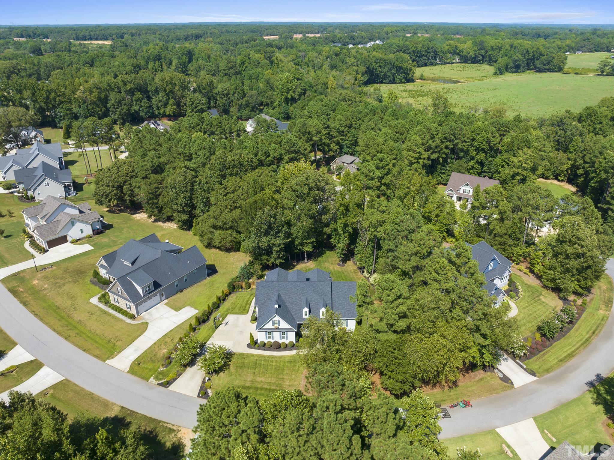 6121 Spring Branch Circle Raleigh, NC 27603 - Photo 53 of 60 an aerial view of a house with a yard