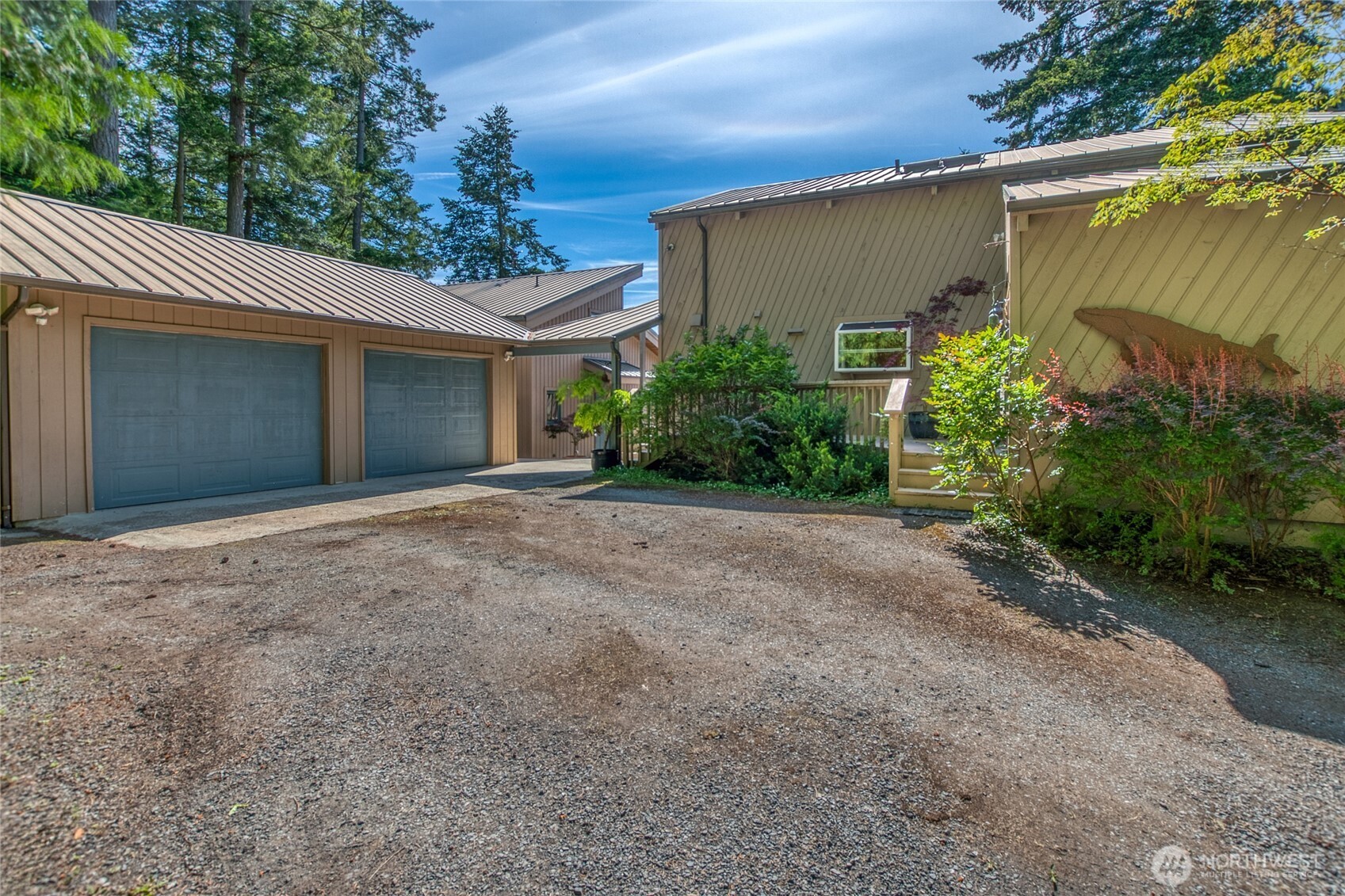 402 Cayou Valley Road Orcas Island, WA 98245 - Photo 8 of 40 a view of a house with a garage