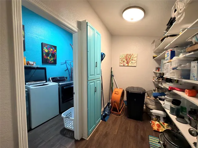 a view of a backyard with wooden floor and a lake view