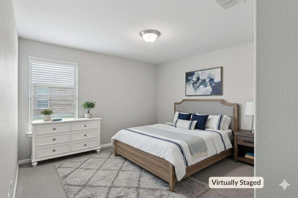 112 Garner Court Forney, TX 75126 - Photo 5 of 15 a bedroom with a bed and a window