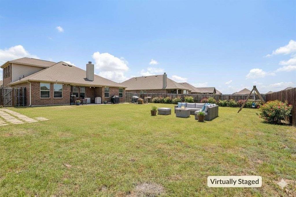 112 Garner Court Forney, TX 75126 - Photo 8 of 15 a swimming pool view with a outdoor seating space