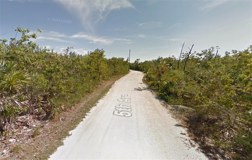 10 5th Avenue Big Pine Key, FL 33043 - Photo 2 of 6 a view of a pathway of a building