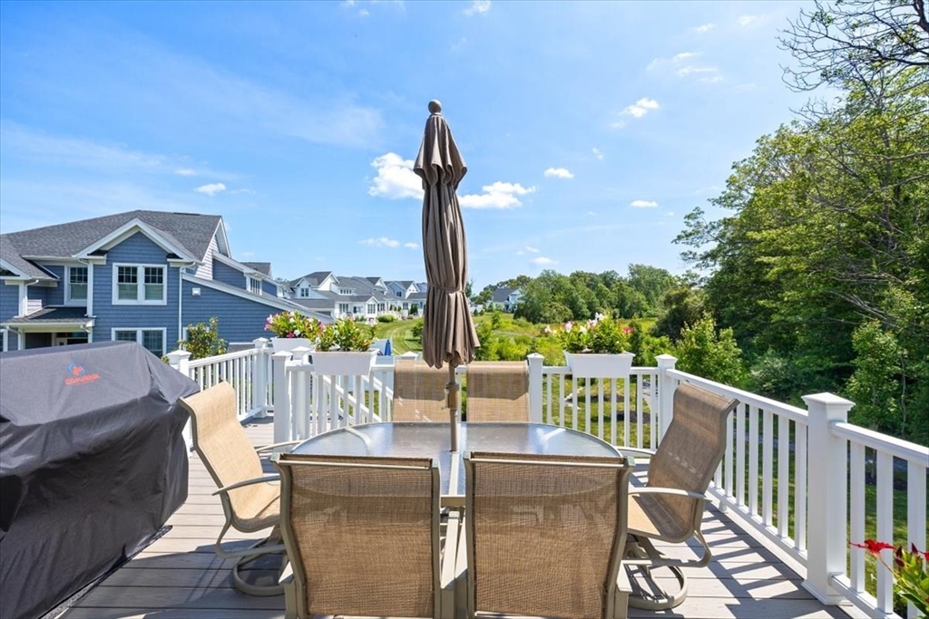 5 Brand Boulevard, Unit 5 Scituate, MA 02066 - Photo 13 of 42 a view of a balcony with furniture