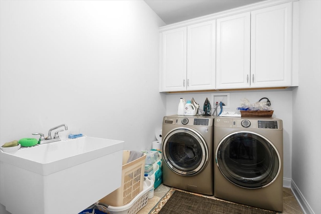 5 Brand Boulevard, Unit 5 Scituate, MA 02066 - Photo 15 of 42 a utility room with dryer and washer
