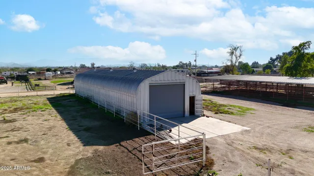 a view of a swimming pool with a yard