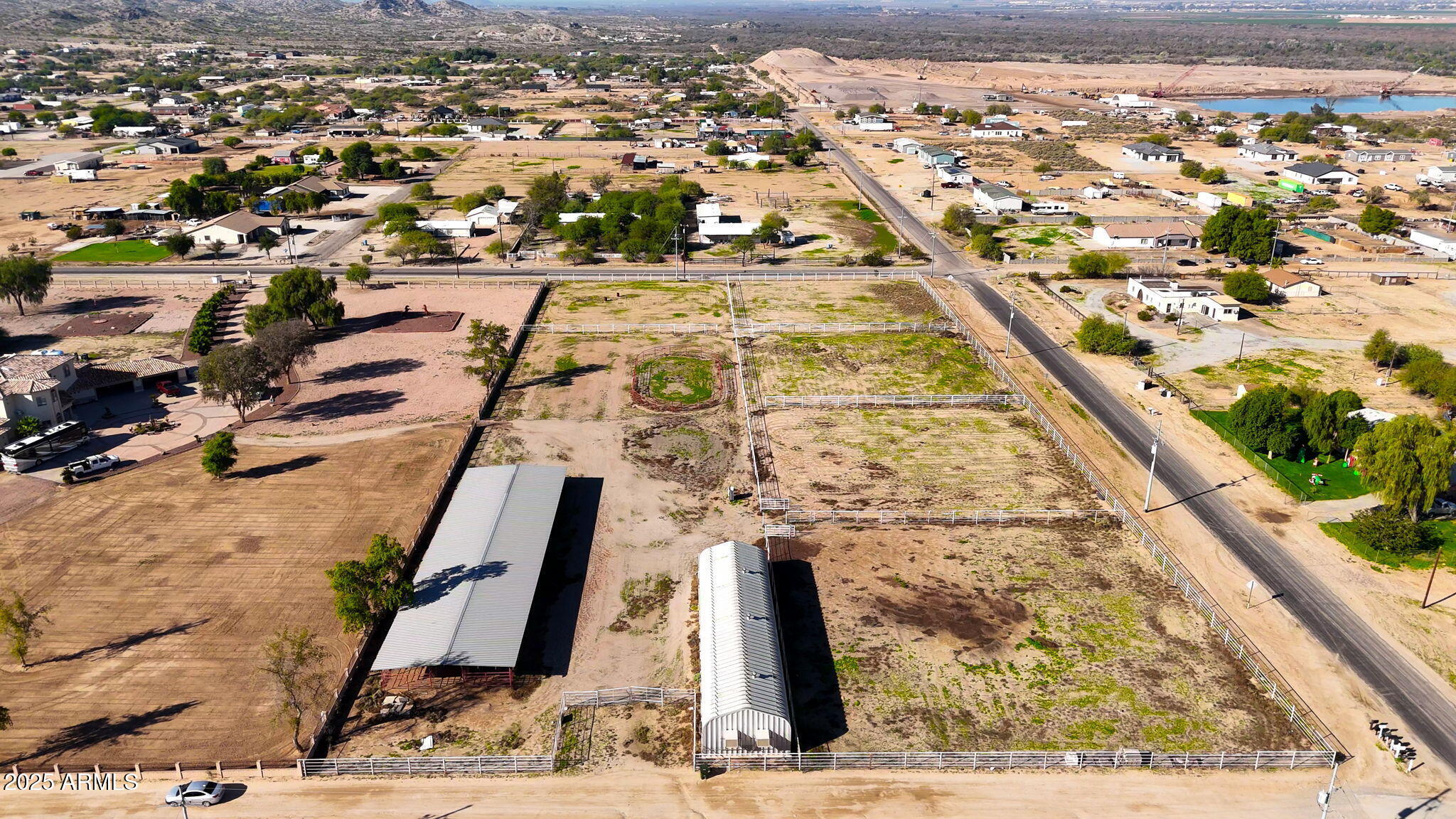11743 South Dean Road Buckeye, AZ 85326 - Photo 8 of 14 an aerial view of residential houses with outdoor space