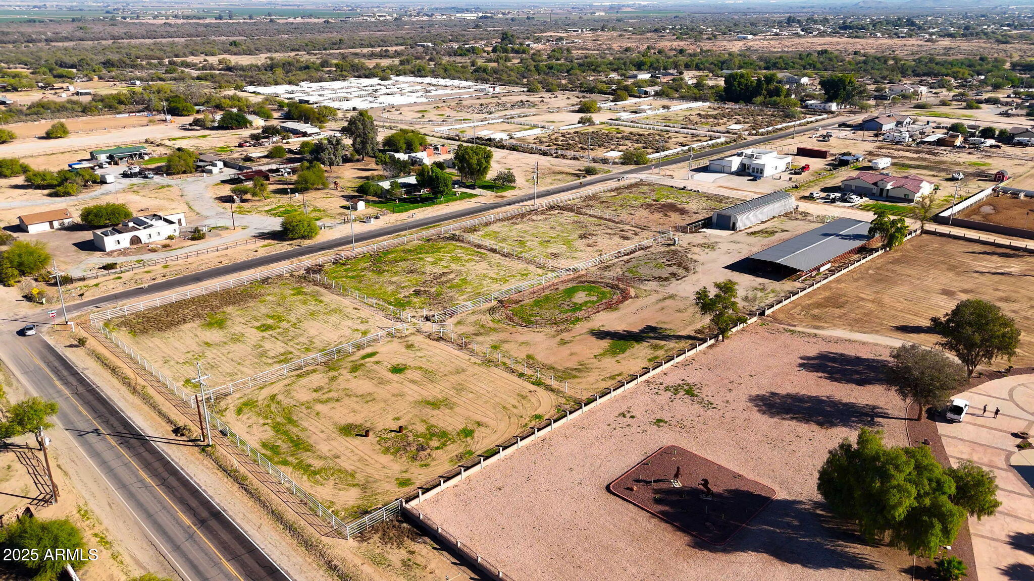 11743 South Dean Road Buckeye, AZ 85326 - Photo 10 of 14 an aerial view of residential houses with outdoor space