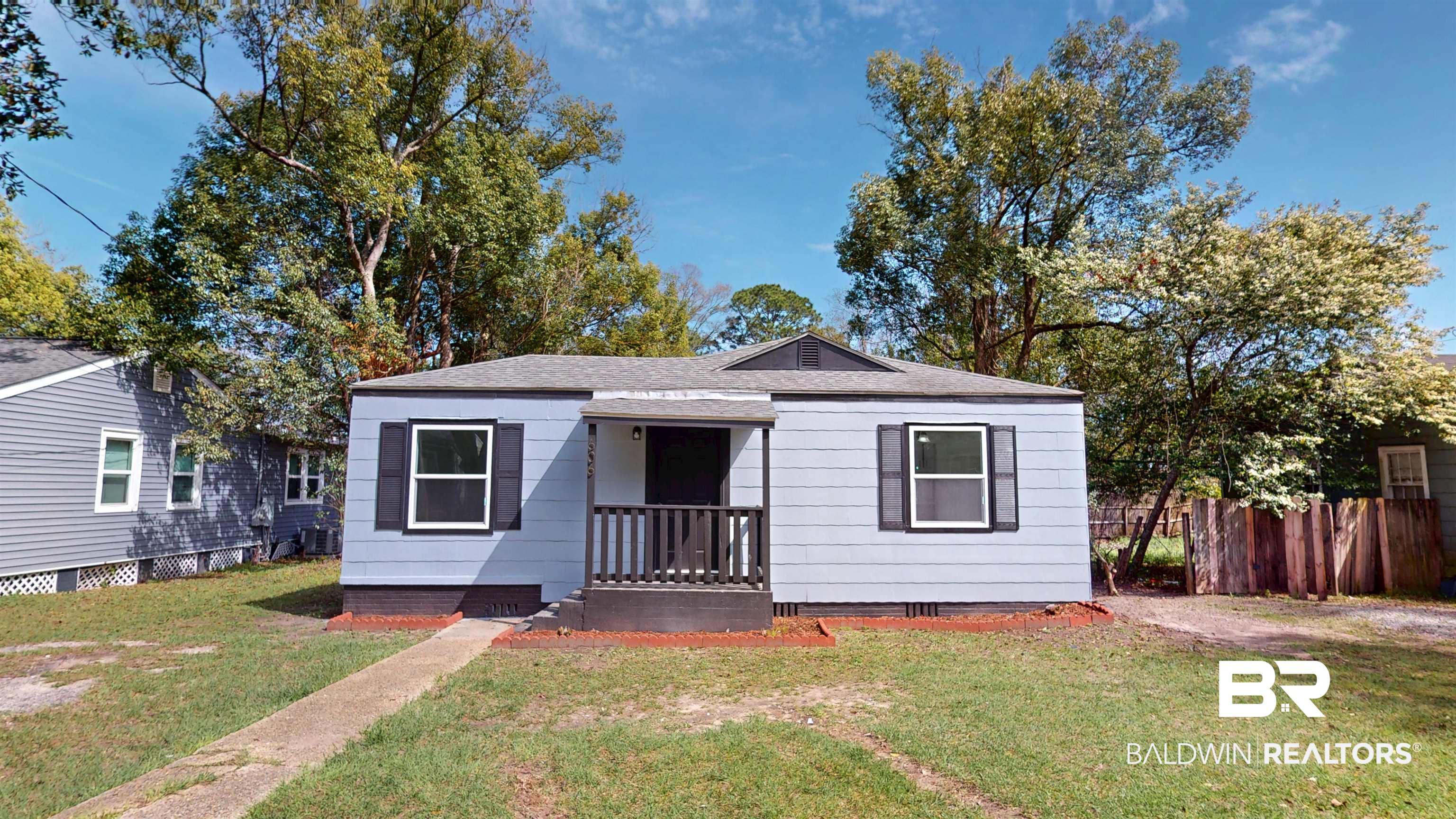 606 Shady Oak Drive Mobile, AL 36608 - Photo 1 of 14 Bungalow with crawl space, a shingled roof, and covered porch