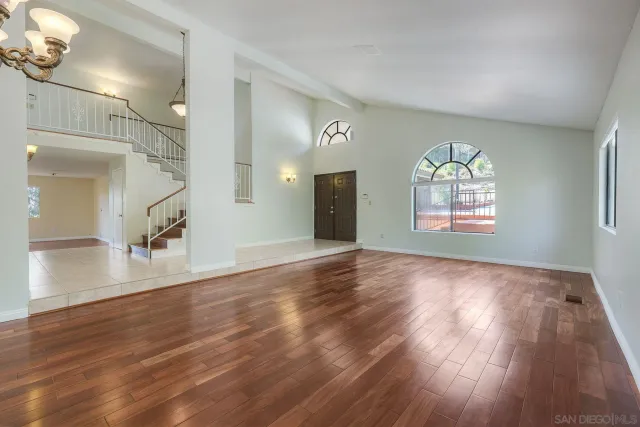 a view of an empty room and window