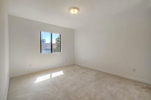 a view of a swimming pool with an outdoor space