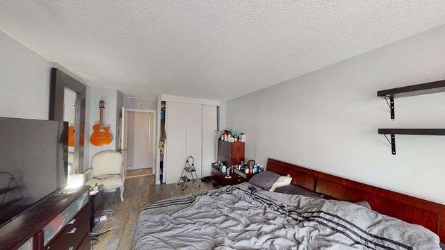 a view of living room and kitchen