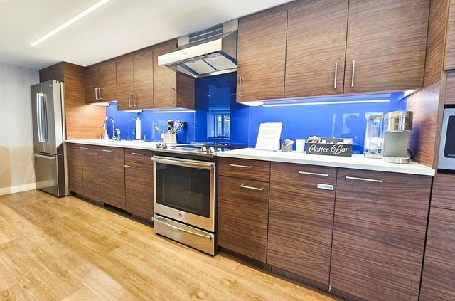 a view of a living room and dining room