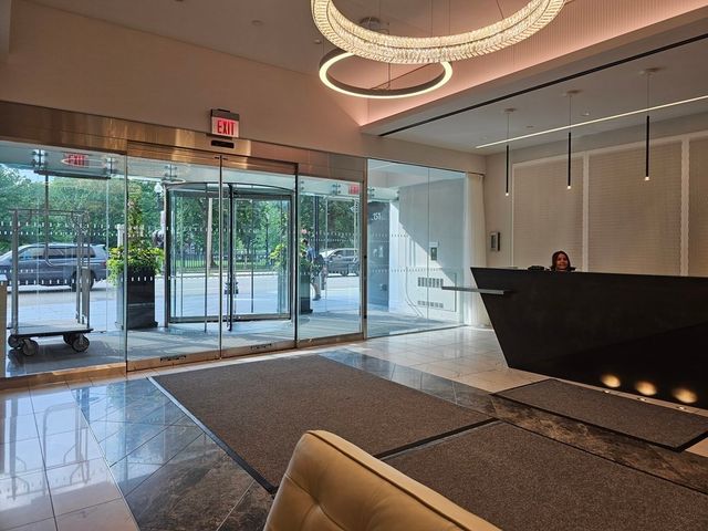 a view of a livingroom with furniture and a fireplace