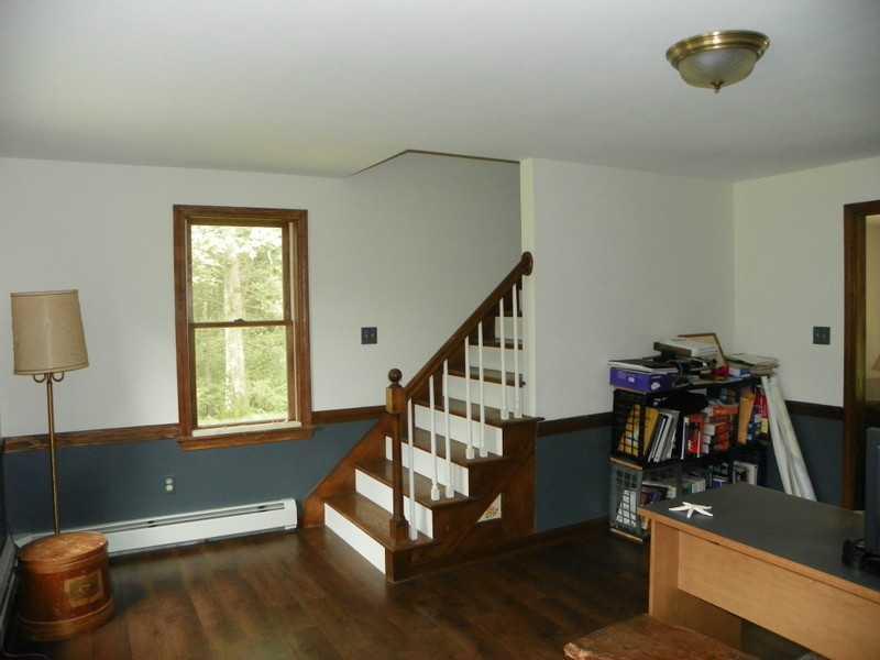 137 Whitten Road Kennebunk, ME 04043 - Photo 15 of 32 Living Room. This staircase leads to...