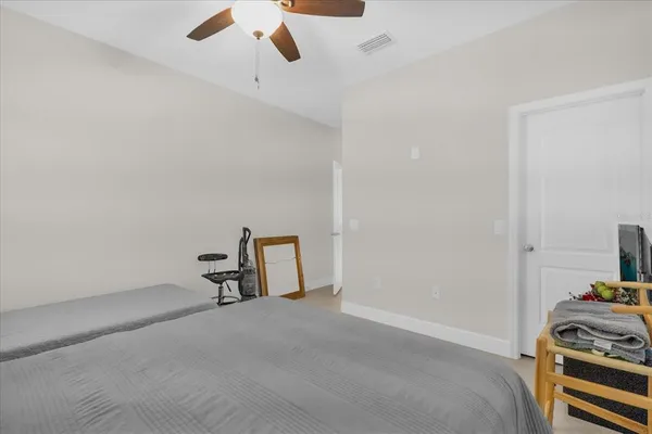 a room with a air conditioner and a stove