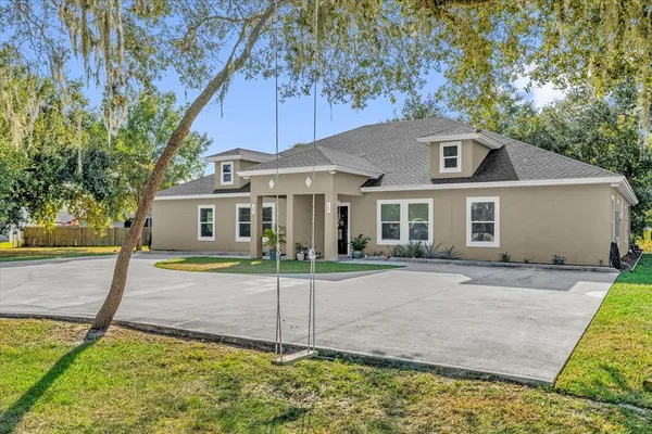 front view of a house with a yard