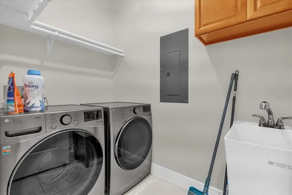 a utility room with dryer and washer