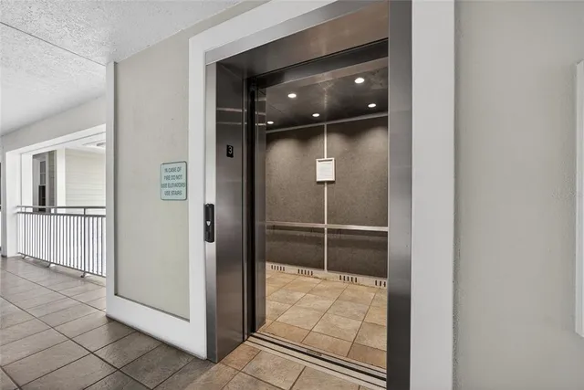 a view of a door and a window in an empty room
