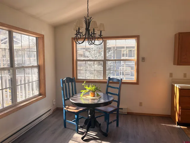 a view of a bathroom from a hallway
