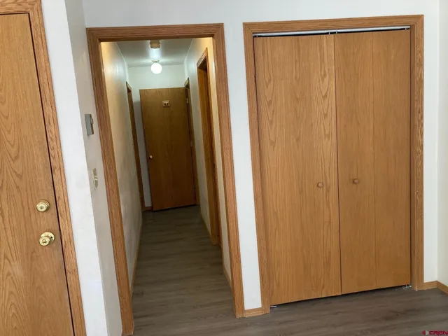 a view of a bathroom from a hallway