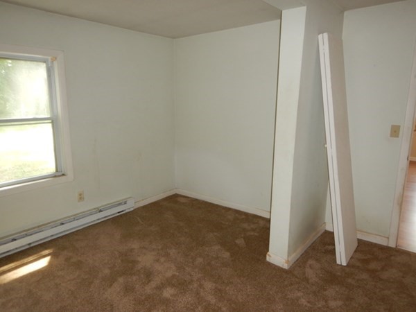 23 Vincent Street Springfield, MA 01129 - Photo 12 of 20 an empty room with windows