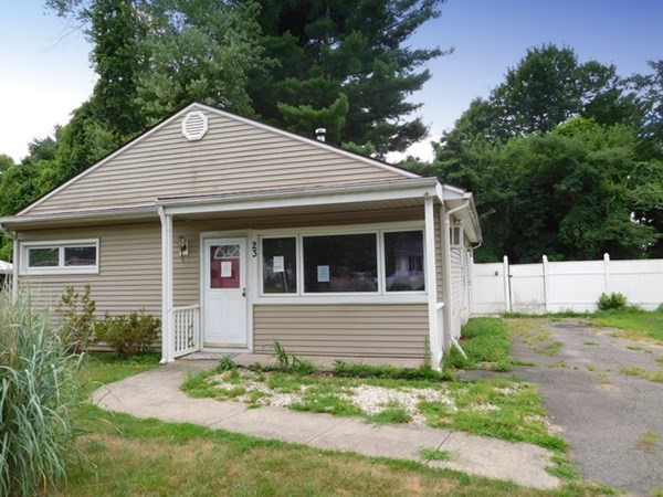 23 Vincent Street Springfield, MA 01129 - Photo 3 of 20 a front view of a house with garden