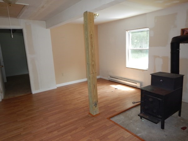 23 Vincent Street Springfield, MA 01129 - Photo 9 of 20 a room with wooden floor and windows