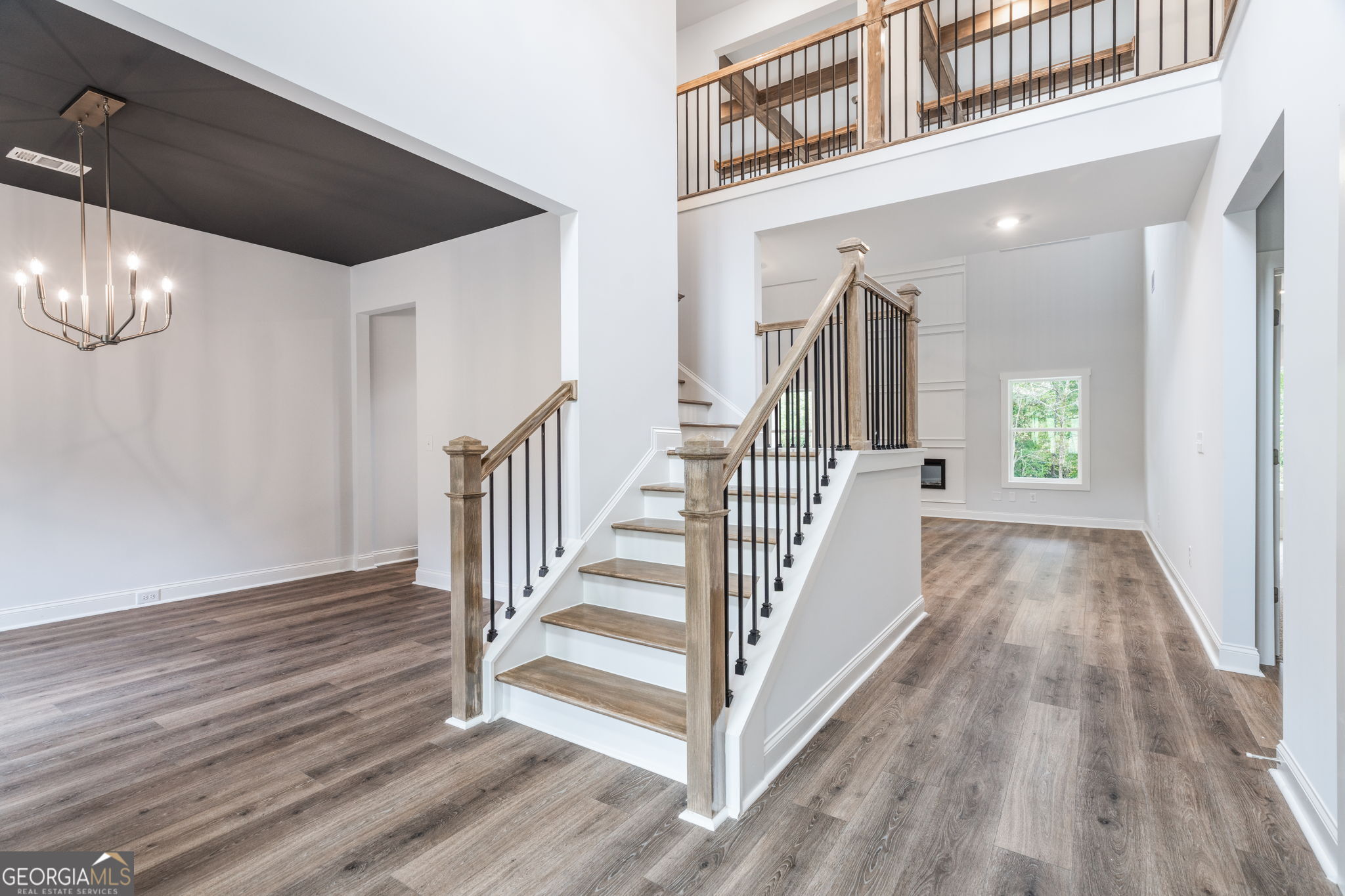 102 Mill Race Road Thomaston, GA 30286 - Photo 2 of 57 a view of a hallway with wooden floor and staircase